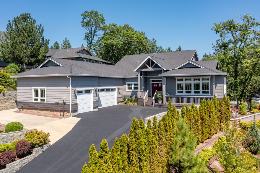 Custom Contemporary Elegance in the City......Boasting over 3915 sq ft of extraordinary detail this turnkey view home will certainly force you to take notice! The kitchen is a showstopper with views in all directions and top of the line new appliances, quartzite counters, Monogram gas range, large eating island and under cabinet lighting. Featuring 3 bedrooms, 2.5 baths, family room, formal living, and dining room as well as small office area off the kitchen.  Easy indoor-outdoor living with large covered space, inground rock pool with waterfall, small wood shop or artist studio and a wine cellar or man-cave. The treed backdrop is perfect and the home sits up with city and Westerly views forever.  Extra parking and 3 car extra large garage. You have been waiting.....finally a home that delivers it all!