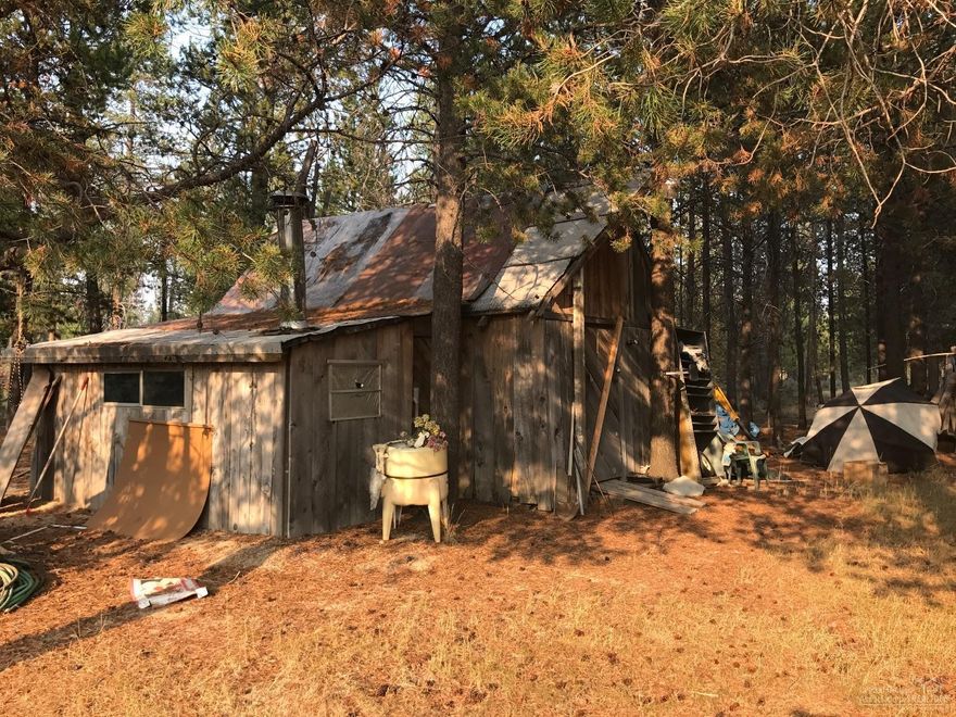 2 Acres in Sun Forest Estates. Two Separate Tax Lots. Cabin could be used for a Get Away or Stay in it while you build a Home, would require some TLC. Cabin does have electric, water and septic.