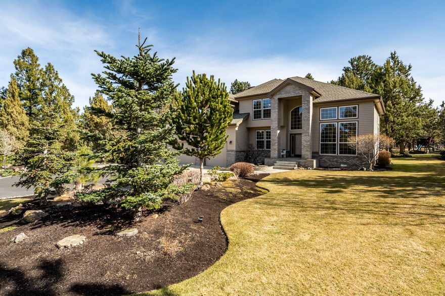 Phenomenal NW Bend location on .92/acre! Experience the Bend lifestyle from this park-like setting, graciously situated at the end of a quiet cul-de-sac in the charming community of Wyndemere. This delightful 4BR/2.5 BA home features a spacious Great Room and cook's kitchen with granite slab, large working island and informal dining area with access to back deck for easy al fresco entertaining. Main level home office/5th BR and light-filled formal living and additional dining area. Upstairs: Master Suite with recently updated Master Bath features quartz dual vanity, large soaking tub and walk-in closet. 3 additional bedrooms and full bath up. Enjoy relaxing under the Central Oregon skies on the expansive back deck with hot tub overlooking the Ponderosa Pines and exquisite backyard. Large 3 car garage with additional storage room that could also be a potential enclosed shop. Short walk to Deschutes River Trail and neighborhood park. Close proximity to schools and all Westside amenities.