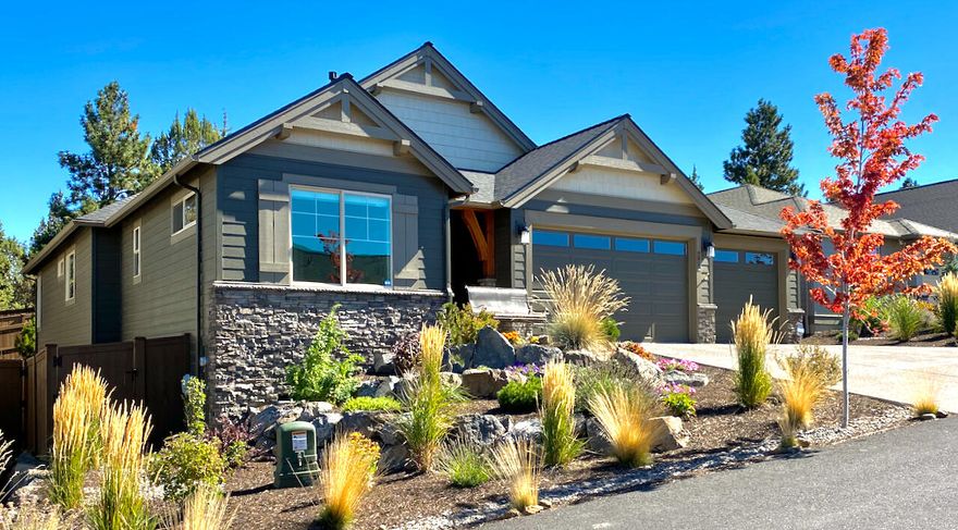 Exceptional SINGLE LEVEL home in The Bridges at Shadow Glen featuring a RARE .16/acre elevated lot with Cascade views. Thoughtfully designed open floor plan w/light-filled Great Rm offers vaulted ceilings, wood flooring, gas fireplace, and a wall of windows framing the private outdoor setting and tree-tops. Chef's Kitchen w/expansive island, Quartz countertops, SS appl, and oversized walk-in pantry. Primary Suite w/coffered ceilings and access to back patio. Primary Bath offers dual vanities, soaking tub, tiled shower, and generous walk-in closet. 2 additional en suite BR w/excellent separation from Primary. Backyard oasis features an ideal space for entertaining: Covered paver patio, custom landscaping and outdoor lighting, and incredible PRIVACY backing to common space. 3 CAR GARAGE. Community amenities include clubhouse, pool, fitness center, indoor sport court, playground, and walking trails. 10 minutes to Downtown Bend. Easy access to shopping, schools, and 37-acre Alpenglow Park