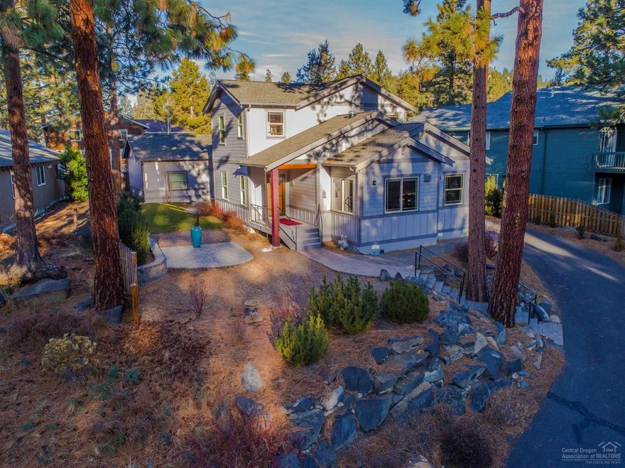 Nicer than new NW Bend home w/main floor master layout conveniently located between OSU/COCC & only 3 blocks from Newport Market! This home features a great room design w/free standing gas stove & built in gas fireplace, a generous kitchen w/tiled countertops, breakfast bar, pantry & all stainless appliances included, hardwood, carpet, & tile flooring, den & study, bonus room, a utility w/sink & tons of built in storage, central gas heat/AC & a private back yard w/paver patio & high end retractable awning.