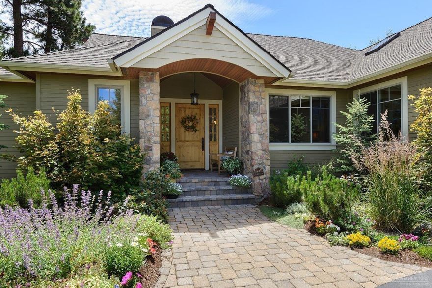 Beautifully designed by Steve Van Sant & blt by Pacwest, this quality home backs to & overlooks common area in The Reserve, for privacy & lovely terrain view. The Great Rm plan is a sgl level except for the bonus rm & 3rd Bd & bath downstairs. 2 master suites + office w/custom built-ins. Gourmet kitchen w/SS appliances, custom cabinets, granite tile island & access to private & south facing Trex deck. FLR to ceiling windows capture natural light. Stone FP w/custom blt-ins. Oversized 3 car garage & mudroom.