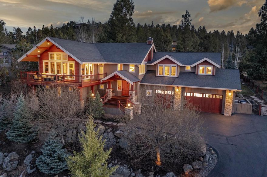 This incredible home on Awbrey Butte lives up to its street name, boasting truly remarkable views of the Cascade Mountains & the valley below. A wraparound
deck along the front of the home invites sunrise coffees & evening cocktail hours as you take in the views. Inside, a vaulted great rm w/ soaring windows on all walls also enjoys the views. Entertain guests in the open kitchen, featuring Dacor 6-burner gas cooktop + dbl oven, Sub Zero fridge, & W/I pantry. Behind the kitchen, pass by a small office area, laundry room, & powder rm on your way to the owner's suite. Enjoy a gas FP, w/i closet w/ built-ins, and incredible bath w/
double shower & soaking tub. The owner's suite includes access to the fenced backyd w/ spa, water feature, & patio, which can also be accessed from the laundry rm & kitchen. Downstairs, an incredible media rm includes a wet bar. 3 bedrooms & 2 bathrooms are also downstairs. Other features include a 3-car garage w/ epoxy, heated drvwy, & many smart features.