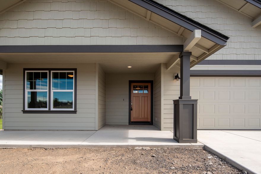Spectacular views from Bachelor to Mt. Hood to Smith Rock from this brand new Wood Hill Homes community. Conveniently located along the western edge of the city limits this neighborhood offers a countryside backdrop w/ easy access to Sisters, Bend, and downtown Redmond. Single level homes, 3 bedroom 2 bath, attractive light & bright floor plans w/ open great room concept. Vaulted ceilings, laminate flooring throughout main living space, gas fireplace w/ tile surround, insulated interior walls, pantry (per plan), stainless steel appliances including gas range, quartz counter tops. Double vanity sinks in master & walk-in closets. Lap siding, fully fenced back yard, covered back patio, front yard landscaping w/ underground sprinklers.