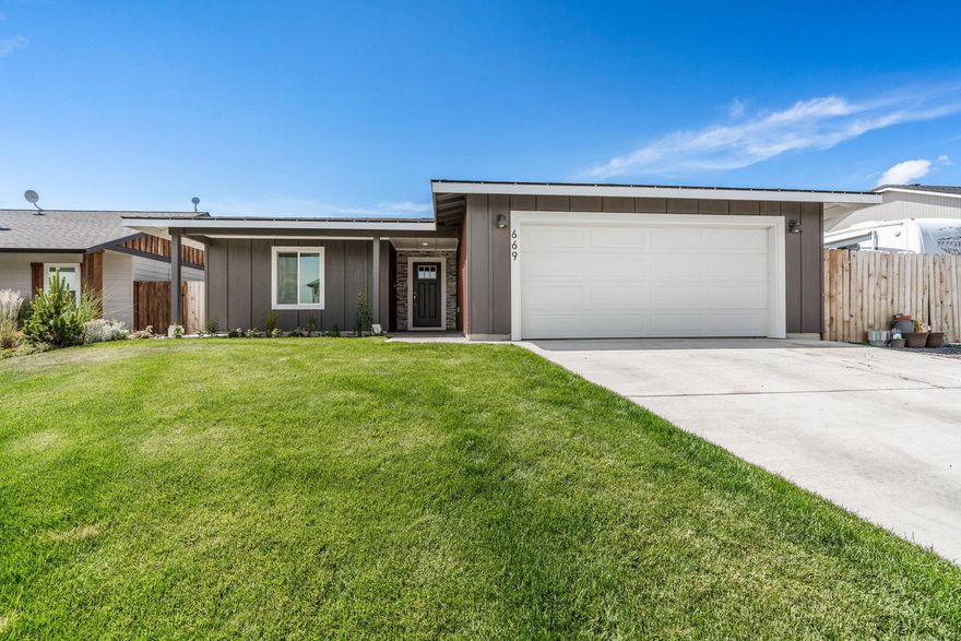 Exquisite gem located in the desirable Morning Crest Subdivision! This stunning 2-bedroom, 2-bath home, built in 2019, offers a perfect blend of modern design & comfort. Step into the spacious 1276 sq ft home, great room offers a corner natural gas fireplace, dining adorned w/elegant coffered ceilings that add a touch of sophistication. The sleek granite countertops, equipped w/all stainless steel appliance & beautifully crafted wood cabinets in the kitchen showcase both style & functionality. Discover the charm of a single-level layout, providing convenience & accessibility. Be captivated by the unique custom barn door & coffered ceilings adding character & charm to the primary suite. Enjoy tranquility of the covered front & back porches, ideal for relaxing/entertaining guests. Fully fenced & landscaped yard completes this picture-perfect retreat. Natural gas furnace, A/C, attached dbl car garage.  Welcome home to a place where elegance and contemporary living intertwine effortlessly