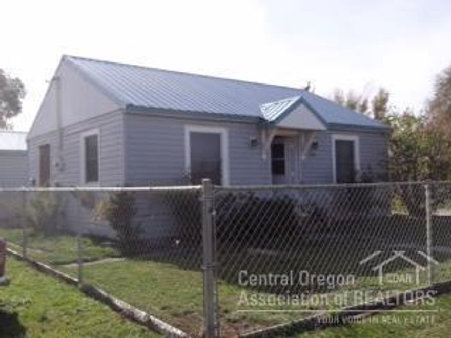 Great investment property. Good location in town. 2bed/1bath home. Metal roof on home and garage. Fenced yard.
