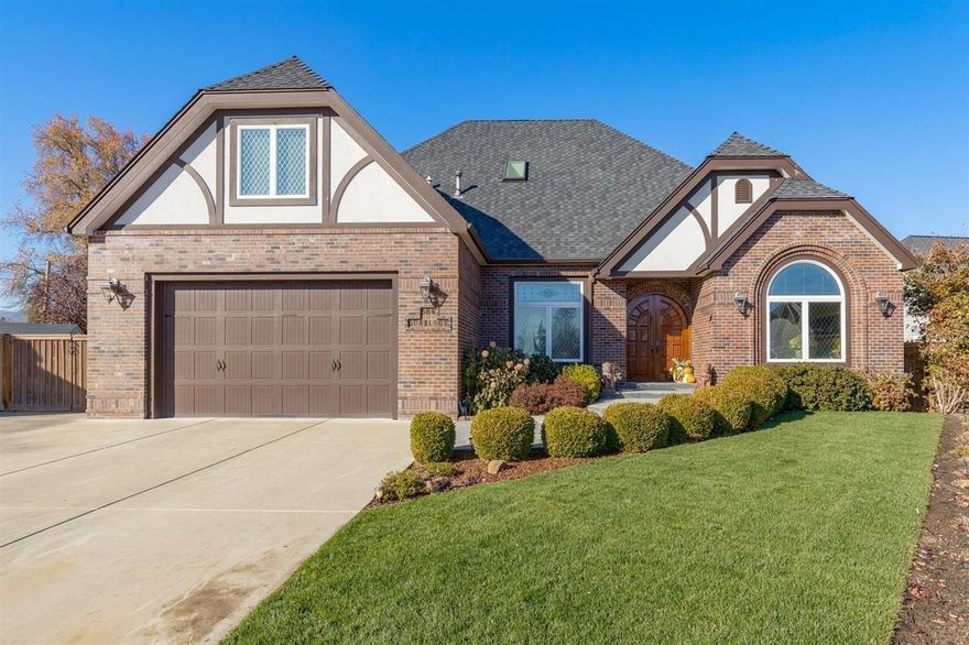 Absolutely stunning elegance from the moment you enter! Grand curved center stairwell is flanked by a salon and formal dining room (currently used as a hobby room). The great room has beautifully coffered and trimmed ceiling with recessed lighting. Granite kitchen with breakfast peninsula opens to the large informal eating area. Butler's pantry and walk-in pantry connect the kitchen and dining room. Main level master suite with jetted tub and killer walk-in closet that even has a corner shoe Lazy Susan! 2nd bedroom suite upstairs in addition to guest bedrooms & bath. Not an inch was spared when it comes to custom door trim ... even the attic access doors in the closets! Surround sound throughout, leaded glass transom windows over all windows and doorways. Large covered back patio accessed from the eating area and the master suite has 220 power. RV parking, beautiful landscaping & curb appeal, and at the end of a quiet cul-de-sac. Security equipment is owned but not active.