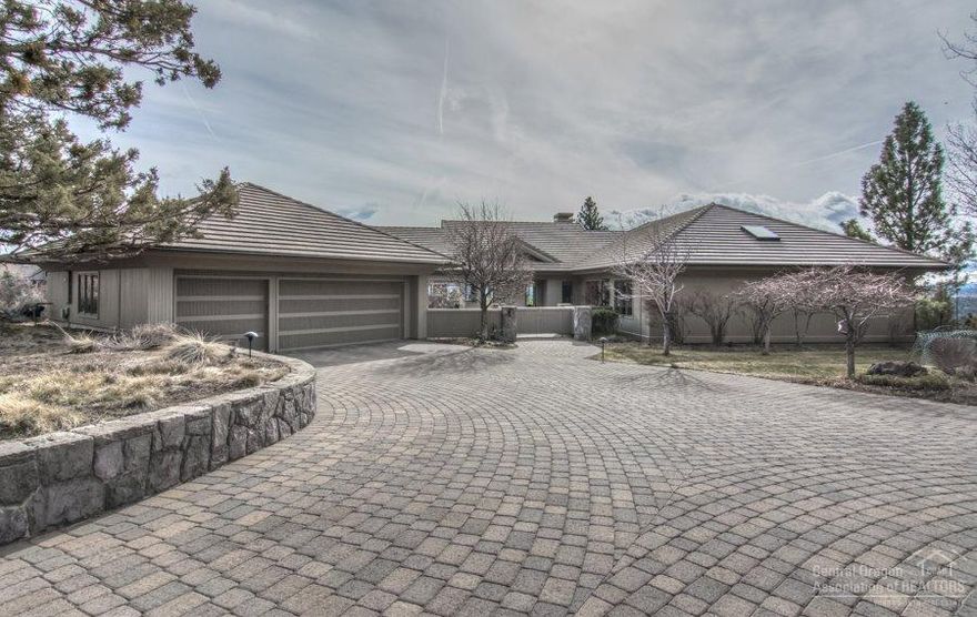 Stunning single level home has Panoramic unobstructed views from Mt Bachelor to the city lights of Bend, on a private one+ acre home site close to downtown. This rare and very desirable home has a timeless design by Steve Van Sant, and quality construction by Rick Francis. Open floor plan with large deck for entertaining and low maintenance landscape. Custom features include 2 Camas basalt stone fireplaces, tile roof, clear cedar siding, filled with built ins, sound system and enclosed entry garden.