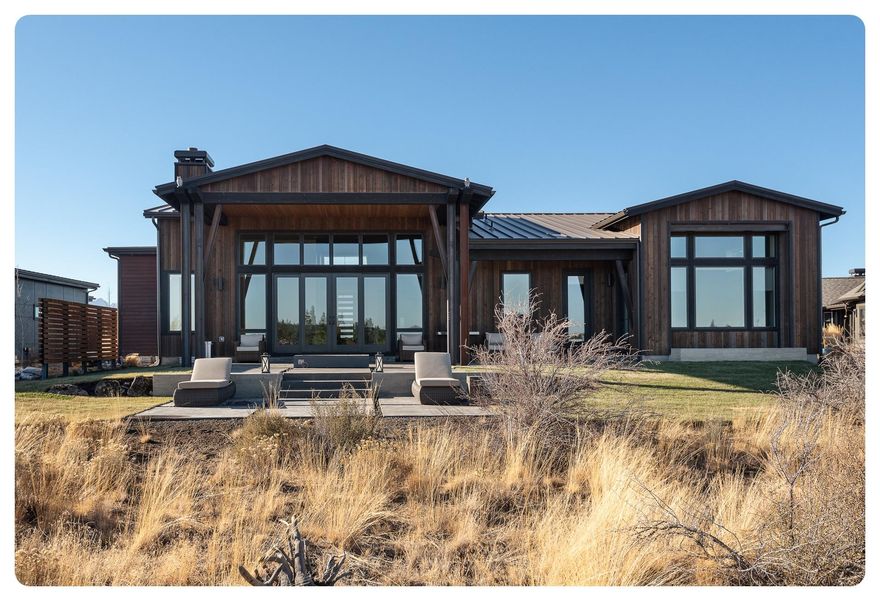 Perched on the ridge facing Tetherow Golf Course, this spacious modern single level home features 3 bedrooms, 3.5 baths, study, & 3 car garage. Move in ready and loaded with goodies including steel accent beams, imported siding from Spain, epoxy garage floors and extensive garage cabinetry, luxurious master suite with soaking tub, walk-in tile shower, dual vanity, and a deluxe closet package, a spacious kitchen with quartz counters and Jenn-Air appliances, office built-ins, front courtyard entrance, and a private backyard with a modern outdoor living area. Great location in Tartan Druim, adjacent to the neighborhood park, with Tetherow and Cascade Mountain Views, neighborhood access to Phil's Trail and the Deschutes National Forest, plus access to Tartan Place which features 3 acres of grass, bocce ball courts, firepit, and more. Conveniently located on Bend's Westside. This is a great place to call home!