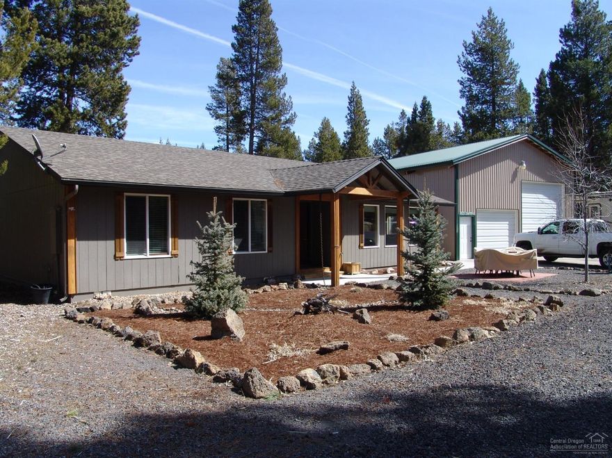 Check out this great 3 bed/2 bath home 1704 with 1 + or - fully fenced and gated acre property in a great location. Property backs to BLM for extra privacy! Home has an updated kitchen and living area and is clean and move-in ready! This single level home is wonderful for entertaining with landscaped front and back yards. Also features a 30 x 40 RV garage/shop with lots of storage, workbench, insulated, large double-door and side door.Close to Rivers, Trails and Much More!!