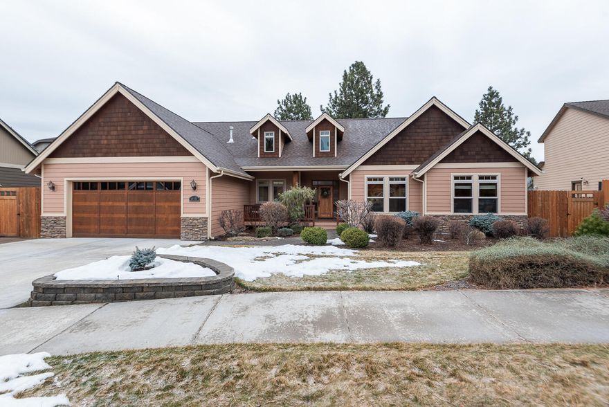 This gorgeous home has it all. Great location in a quiet neighborhood in SE Bend on a .32 acre lot. Single level living features a large open great room with a stone surround gas fireplace. The well designed kitchen features extensive granite counters, beautiful cabinets, a wine fridge and Kitchen Aid stainless appliances. A spacious bonus room and powder bath up look over the large, private backyard that boasts an expansive deck, rolling lawn and mature trees and landscaping. Quality wood doors and trim are featured throughout this lovely home. The original tandem 3 car garage now has an enclosed room which is currently an exercise room. One of the bedrooms features built ins offering a well organized office. Easy access to Hwy, shopping and medical facilities.