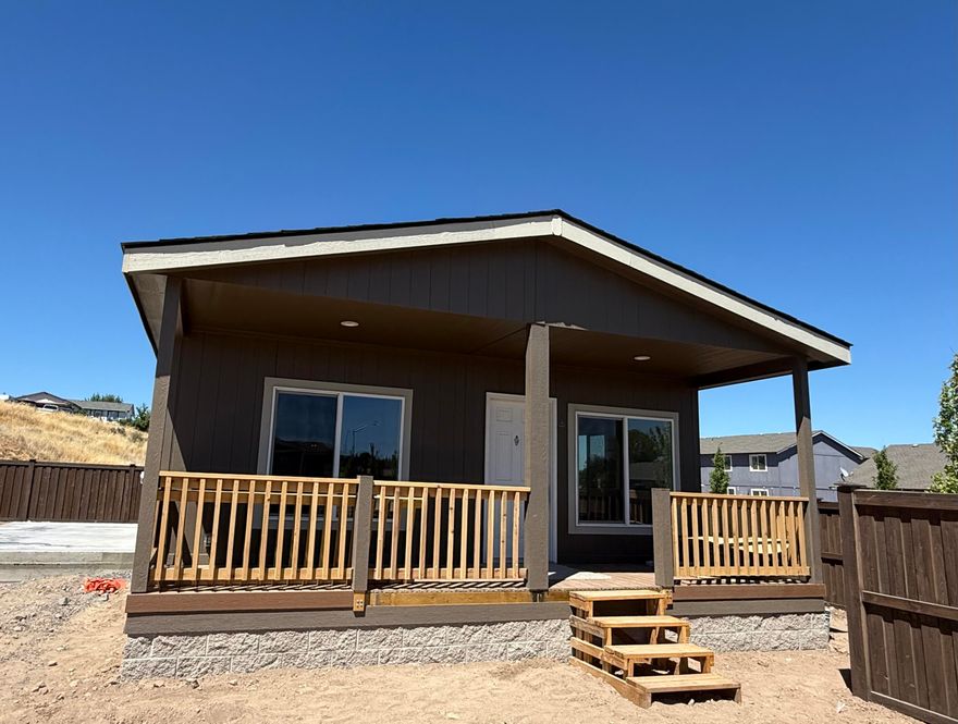 Welcome to Summer Place—Madras's newest gated manufactured home community offering a relaxed, affordable lifestyle just minutes from downtown and local dining.
This 1,026 sq. ft., 3-bedroom, 2-bath home features an open layout with modern touches throughout: Stainless steel appliances,
knotty cabinets, leche vesta countertops, and ceramic tile backsplash. White carrara bath counters, vinyl and carpet flooring, alabaster paint, and a charming 6' front porch. The 1-car  attached garage and double-wide paved driveway is also included with this package. Community perks include a playground, extra parking, and 59 new spaces to choose from. Space rent: $595-$650/month. Floor plans from 2 to 3 bedrooms available.