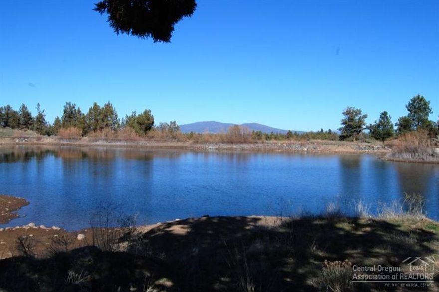 Spectacular 9.74 acre parcel, Smith Rock to Powell Butte views, 4 acre pond with fish and ''in pond'' water rights, .2 acre irrigation with ''in ground'' installation. Installed septic tank and double sized drain field with additional tank for shop. Graded field below home site, seller may apply for irrigation transfer rights, 3 party well to be installed by seller. More details available.