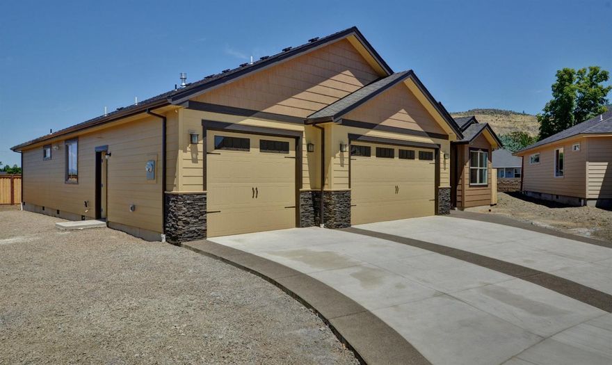 RV Parking!!! 3 Car Garage!!! Still room for a pool or garden!!! Private back yard backs up to a open space buffer with no other homes looking in your back yard the lot is .22 acre , 3 bedrooms, 3 baths with a den. Set up like a double Master Suite. 12x60 RV Parking. Energy Star Certified. Six camera hard wired Security System, Ring doorbell, with exterior motion detector light. On demand tankless gas water heater. Curbless walk-in Master Shower. Ceiling fans in all bedrooms, den, and back patio. Bosch Appliances, Attic Storage, Under cabinet lighting in kitchen. Large tub sink in Laundry room. Built in Pantry, 11 foot cedar lined entry way, Gas Fireplace, floor to ceiling stone. Natural Gas stubbed in back patio. This is the one of the newest homes in the Cedar Landing Community in East Medford (formerly Cedar Links Golf Course) a new progressive neighborhood with a proposed 2.91 miles of trail and over 20 acres of open space.high speed fiber availabl