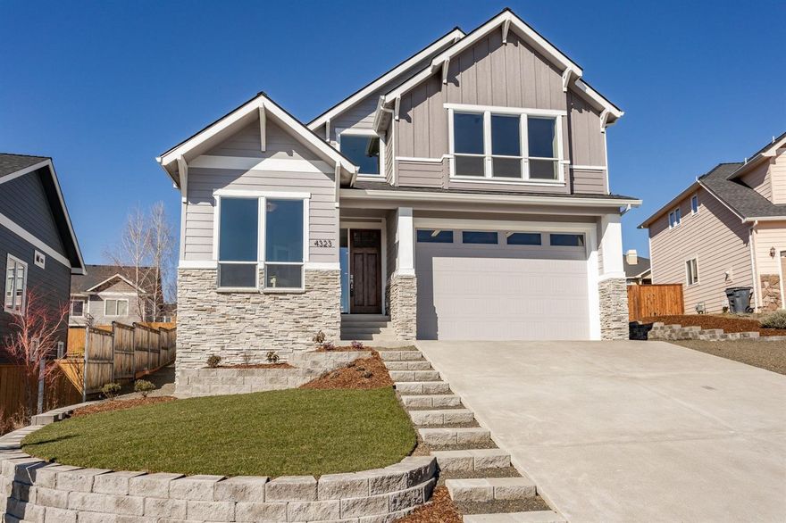 Amazing views from this beautiful new two-story home. Fabulous entry leads into a huge Great Room with fireplace and adjacent Formal Dining Room. The spacious kitchen has a large island, stainless appliances, granite counters and custom tile backsplash, lots of cabinets and is open to both the Great Room and an informal eating area. A den/office w/ French doors and a powder room complete the main floor. A beautiful staircase w/ custom wood & wrought iron banister leads upstairs to all bedrooms, lovely guest bath and utility room with sink and storage. Plus a large 12' x 16' multi-use bonus room that could be a 4th bedroom, media or hobby room. The huge Master bedroom has walk-in closet, extra closet, shower w/ glass tile accents, two sinks and a linen cabinet. The two guest bedrooms are nice sized. The two-car attached garage has a 10' x 13' shop area. Front and backyards are fully landscaped. Back yard is fenced and has covered patio. Large RV and/or extra off-street parking.