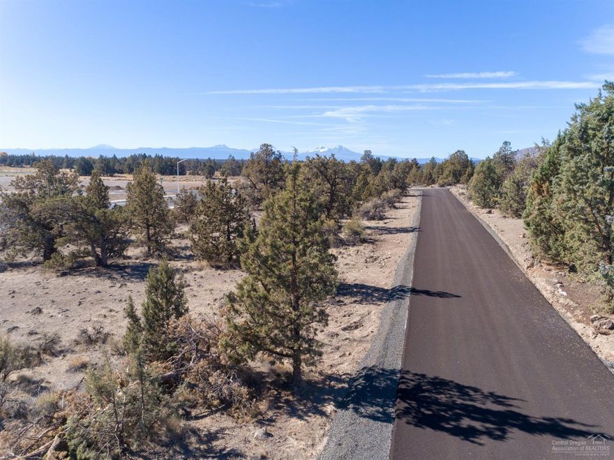 LOT 3 - .31 ACRE Outstanding Building Lot with Potential for Mountain Views in SW Redmond! 1 of 5 Large Lots, ready for your custom home! Gentle slope elevates the view, with sidewalks and utilities in! Located in area of UPscale and New Homes! Lots range from .24 acre to .40 acre.