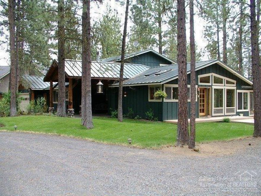 Gorgeous Big Deschutes riverfront home! Situated on 2 lots high above the river with the sound and sights of Pringle Falls. 3 Master suites + Den. 1900 sq ft of Balcony/Decking to enjoy the views. Warm open floor plan, beautiful upscale kitchen w/heated floors, 5 fireplaces, sunroom, French and sliding doors galore to bring the outdoors in. Large Main master suite is nestled up in the trees with it's own balcony over the river. A must see!
