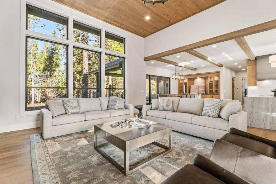 Discover the perfect retreat in Caldera Springs—designed for those who crave comfort, elegance, and the outdoors. This beautifully furnished home is nestled on scenic Cottontail Loop, one of the community's most exclusive and peaceful settings. Step inside to find an airy, light-filled layout where the great room, bonus room, and gourmet kitchen come together for effortless entertaining and everyday living. Thoughtful finishes, inviting fireplaces, and expansive glass doors invite you to unwind in style. Step outside to your private outdoor haven, complete with a sunken hot tub and over 600 square feet of covered and uncovered patio space—ideal for dining under the pines or soaking in the stars. Whether you're looking for a year-round residence or a seasonal escape, this exceptional property offers the best of the Sunriver lifestyle.