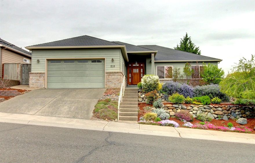 First time on market. Beautiful, one owner home in Central Point East subdivision. Custom built for the owner, this 4 bedroom/2 bath home is 2224 sq.ft. with large tile entry and a foyer with 12 foot ceilings. From there it opens to large living room with high vaulted ceiling. There is a wonderful gas fire place with granite hearth and beautiful wood mantle. The kitchen is spacious with granite counter tops, custom cabinetry, and lots of built-ins. Large laundry room and pantry. Beautiful oak hardwood flooring in dining room, 4th bedroom (office/den), and in the hallway. Great floor plan in an awesome neighborhood. Extensive work went into the landscaping of the yard with lots of rock work and retaining walls. It also has a great covered back patio. There is additional storage under the home as well. Seller is offering a $2500 carpet allowance with acceptable offer. Don't wait this home will not last!