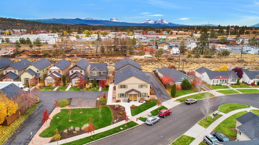 Here's the income property you've been waiting for! Newer, low maintenance 4-plex, conveniently located right off Empire and the parkway! The large lot affords space for an additional structure (Buyer to do their own due diligence). All units are 3 beds / 2.5 baths and feature attached oversized single-car garages! Under-market rents provide great upside potential for investors! Beautiful finishes throughout, efficient floorplan, A/C and so many other great features to attract the best tenants! Just blocks from US Market, Backyard Pizza & Wild Roots Coffee! Don't miss this rare small multifamily offering in the heart of NE Bend!