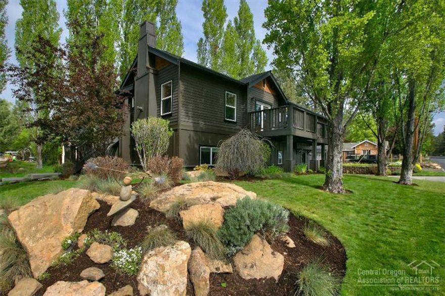 Custom craftsman located in Bend's desirable Westside. This home is in the heart of it all with Breweries, Shops, Eateries and the Deschutes river just blocks away. Spacious 2774 sq ft, 3 bedrooms, 3 bathrooms with high end finishes throughout. Reverse living floor plan that offers fantastic privacy and a 2nd level patio for BBQing and enjoying the westside activity. Downstairs is a large family room/game room for entertaining with a full bathroom & mud room. Don't miss your chance to own on the Westside!