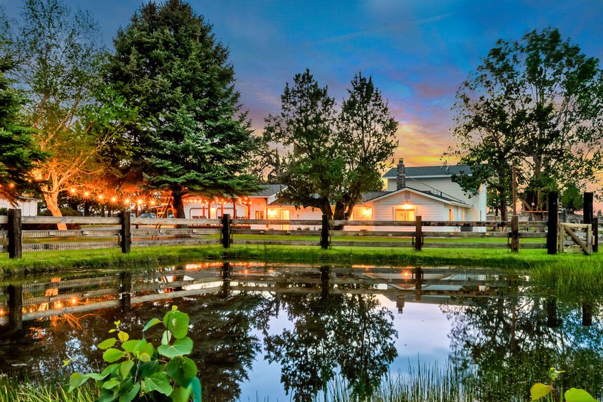 Peaceful 10 acre country retreat just minutes from town. Extensive updates completed on this open concept farmhouse with great flow and mountain views! Features 2,410 sf, 5 bedroom home, 300 sf detached studio, 2,160 sf shop, 800 sf covered storage, detached 2 car garage with 440 amp svc. Property is fenced & X-fenced with 2 ponds & 3.5 acres COID irrigation newly 100% underground. Enjoy the private patio with new hot tub and large covered patio, great for entertaining. Updates and additions include new bathroom on main level in Feb '23. New roof in '21. All new exterior siding, new guest studio, all new windows and doors, private deck off master suite, interior & exterior lighting & paint, appliances, heat pump, new carpet, poured concrete shop floor, cedar planter boxes, tree house, zip line & MTB track. Stunning garden area with deer fencing features fruits, berries, herbs, & raised beds.