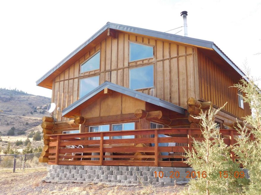 Location, Location, Location!! Looking for gorgeous views? Beautiful Log home built on 2.33 acres to enjoy those view from. Features include 2 bed, 2 bath, 1716 SF that is light, bright & open. Master suite is an open loft with soaking-jetted tub, shower, double sinks & nice French doors. Wonderful craftsmanship & fixtures thru out. Fenced side yard that is great for dogs & kids. From the home enjoy views of Ana Reservoir, Ana River, Summer Lake, Winter Rim with lots of birds & wildlife as an added bonus.