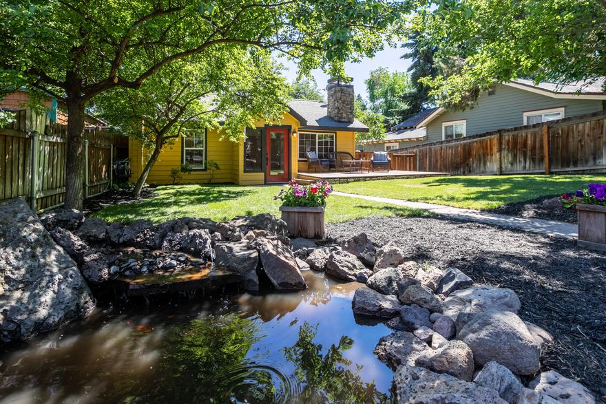 Located in NW Bend near Galveston Ave. This charming craftsman home is 6 houses away from Columbia Park and the Deschutes River. A few blocks to restaurants, shopping, schools, the Deschutes River Trail and Phil's Trail. Enjoy upgraded amenities throughout including high efficiency wood stove, forced air heat with built in humidifier. Central Air (A/C), large 25' by 30' back deck over insulated/heated garage (in alley) access to private hot tub off the master with view of Columbia Park. Granite counter tops in kitchen with stainless appliances. Hardwood, travertine and carpet. Iron fenced in yard, stamped concrete driveway in front paved drive in back with RV parking. Dolby 5.1 throughout. Don't miss this opportunity to live in the heart of the West Side of Bend.