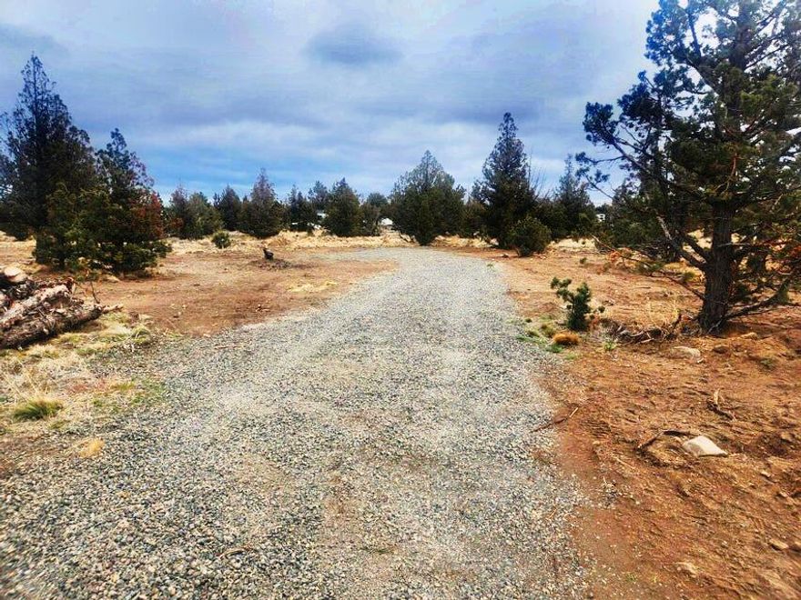 Come build your dream home on this 1.81-acre corner lot located in the Prineville Lake Acres Unit 2 Subdivision, positioned at the intersection of Pawnee Loop and Yakima Road. The infrastructure is already in place for you— the property is served by a shared well, a cap-and-fill septic system has been installed, and power is on the property. If you're looking for additional space, the neighboring lot is also available for purchase at an additional cost. Buyer to perform their own due diligence with the Crook County Planning Department regarding approved building and land use.