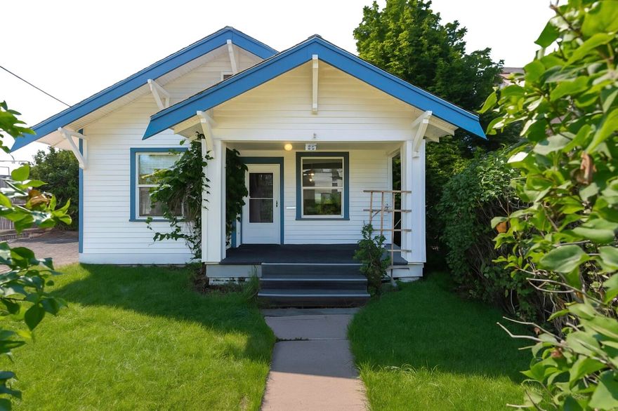 Incredible location for this west Bend home, offering a blend of historic charm and modern updates. Located just minutes from Drake Park, Jackson's Corner, and the Old Mill, it features updated flooring, custom built-ins throughout, and a roomy utility space with a kitchen nook. This home has a Jack and Jill bathroom with shower/tub combo, large bedrooms with real fir hardwood trim, and roomy closets. Enclosed patio/porch with new shades for added relaxation and enjoyment.

With convenient alley access, dedicated RV parking, and a detached garage that includes an upstairs room with extra storage, this property offers versatility for work, hobbies, or potential ADU conversion.

The expansive front and backyards, are shaded by mature trees, providing a perfect setting for gatherings or quiet evenings on the patio.