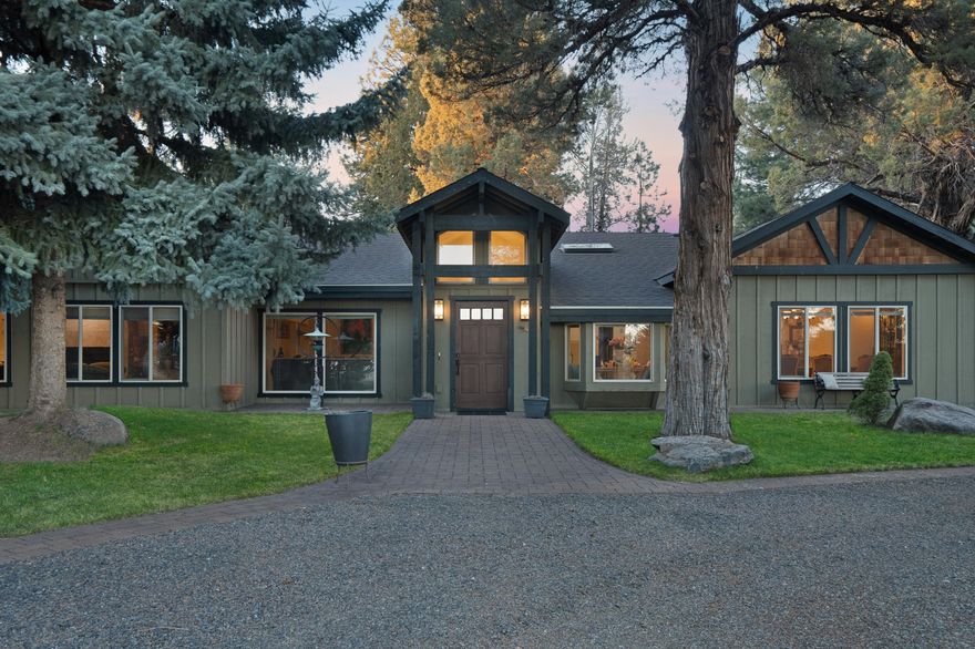 Indulge in the epitome of ranch living on this expansive 63-acre property, featuring a grand 4,797 square-foot main residence, a private guest home, a distinct apartment, and picturesque mountain vistas. Enjoy an array of opulent amenities amidst the tranquil beauty of the surroundings. The main home features multiple en-suite bedrooms and spacious outdoor areas, perfect for relaxation and entertainment. Explore landscaped paths leading to three tranquil ponds and enjoy panoramic vistas of the Three Sisters and Broken Top Mountains. This exceptional estate includes an 8-stall horse barn, garden, greenhouse, pet kennels, and a large workshop. With room for up to 14 cars and 4 RVs, it caters to car enthusiasts. Wildlife enthusiasts will delight in observing deer, elk, bald eagles, and more. Additionally, 56 acres of hay fields with 1895 senior water rights ensure ample irrigation. Water distribution is managed efficiently through a pressurized system.