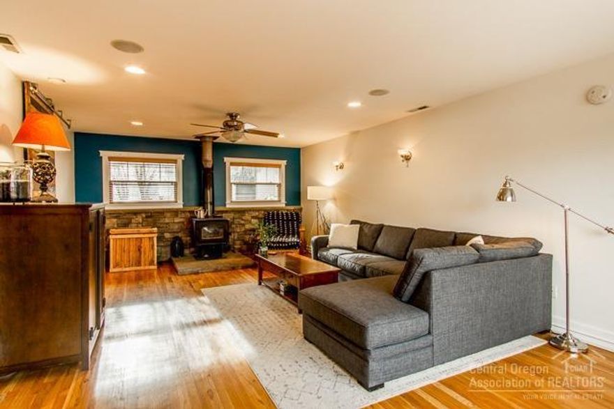 Located across from Columbia (Pirate Park), and close to the river, this single level home sits in the heart of Bend's westside. This home has been updated and boasts beautiful hardwood floors, an updated kitchen, a larger master bedroom, plus an additional office or nursery space. The spacious front deck is perfect for entertaining friends in the summer. Store your toys in the detached garage. Conveniently located between Drake Park and the Old Mill!