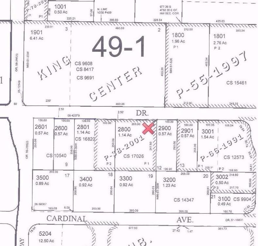 Industrially zoned lot near Hobby Lobby and Walmart. Great location for offices or warehousing uses.