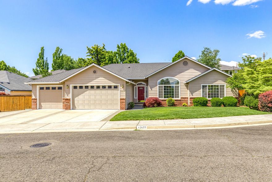 Great neighborhood close to the Rogue Valley Country Club. 2420 sq ft built in 1999 with updates. 4 bedrooms and 3 full baths, with 15 x 36 RV parking with hookups, and 3 car garage.  Nice large entrance with hardwood floors, high ceilings, wide hallways and vaulted ceiling in the living room. Formal dining open to the family room with fireplace. Kitchen with high-end kitchen aid oven and gas cook top, pantry, granite counters with lots of storage and open to the family room with eating bar. Light and bright 4 bedrooms, both main baths have tile flooring, granite counters with tub/shower surround. Large primary bedroom with a Coffard ceiling, walk in closet with built-ins. and door to covered patio. Primary bath double sinks and granite counters, tile floors, soaking tub, enclosed lavatory, and separate shower.  HVAC is high efficiency Lennox system. Large inside laundry room walks out to 3 car garage with attic storage. Covered patio, beautifully landscaped front and back yard, shed.