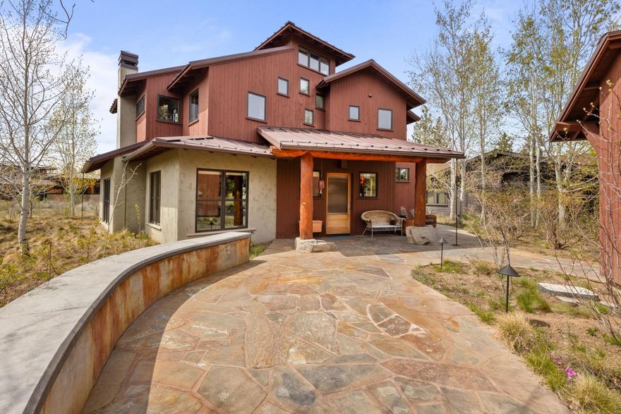 Located in the coveted Shevlin Commons community, this special custom home is constructed like a prestigious work of art. The main home is 1971 SF while above the detached garage is a 384 SF studio w/ full bath creating a perfect guest suite, private office or art studio. Experience the exceptional craftsmanship & premium materials rarely seen today. The main level offers an office, full bath & mudroom. A stone rock fireplace brings a natural feel of Central Oregon to the modern stylistic touches. The radiant heated concrete floors flow into the inviting kitchen with custom cabinetry, concrete counters & updated appliances. Upstairs, find three bedrooms including a primary suite featuring a private balcony w/ Views of Mt Bachelor. Each detail is complimented by the abundance of natural light in every room. Half a mile from the Shevlin Commons Trailhead for access to hiking & biking out your front door. Plus, enjoy the community clubhouse with lawn, entertaining space & water feature.