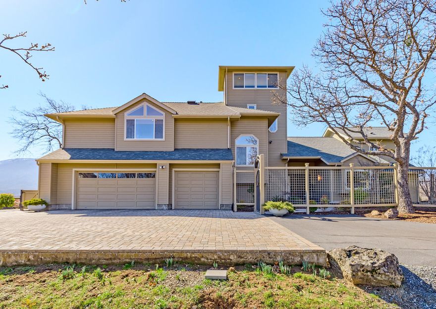 Rural paradise on the outskirts of Ashland! Located 5 short minutes to downtown Ashland, OR sits this one-of-a-kind family getaway. The property itself is perched high above the valley allowing for expansive views in all directions, all on a dead-end road with supreme security and privacy. The amazing home is built with quality and love which features 5 beds, 6 baths, a formal living room and dining room, master suite with full bath, balcony, built in fireplace and massive walk-in closet. With 4 additional bedrooms, a large craft room, tons of storage, and a 3rd story cupola with 360 degree views makes this a must-see home and property. Custom touches include 2 gas fireplaces, automatic sun screens, dedicated office, whole house surround sound, 2nd master suite, various built-ins, and natural light throughout. The manicured property features expansive views, 1 acre of irrigation, mature and easy landscaping and covered porch areas for entertaining! Contact agent for complete packet.