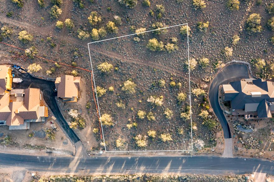 Immerse yourself in the tranquility and exclusivity of Brasada Ranch Resort with this exceptional homesite. Boasting captivating mountain views to the west, this homesite offers unparalleled privacy as it backs onto undeveloped public lands, ensuring a serene and undisturbed future. As a Brasada Ranch member, you'll enjoy access to a world-class array of amenities, including an athletic center with multiple pools, a lazy river, and an equestrian center. Indulge in the pleasures of golf on the championship course designed by Peter Jacobson and Jim Hardy, or embrace the outdoors with hiking, biking, horseback riding, and fishing. This lot presents an extraordinary opportunity to create your dream home or vacation rental in the beauty of a renowned Central Oregon resort.