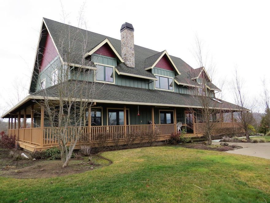 Are you looking for an incredible home along with a horse property that has a positive cash flow?? Here is a custom built home with 4056 sqft. Right off of the master suite you can enjoy the valley views from the covered porch! Excellent use of space that can offer extended living for guests or family. Gourmet Kitchen that is open to the living area and a bonus room for that needed space. This home even has a generator system for backup safety. The ranch offers all a horse enthusiast could imagine. Covered arena, outdoor arena, barns, trail course and plenty of trail riding. The ranch is currently a boarding facility that is so popular there is a waiting list! Plenty of pastures and even tack lockers. 123.27 acres with 80 in irrigation. Hay production was over 4500 bales last year! 2nd home on the property, great well. Ranch equipment and furniture in the main home can be purchased separately to make this turnkey and ready to make your own.