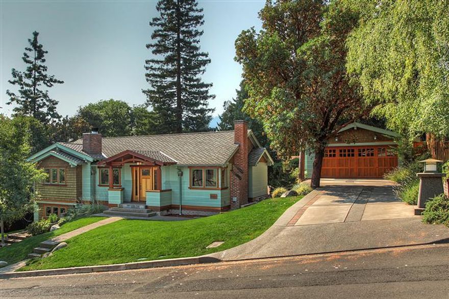 Location! This Period style residence is located in one of Ashland' Historic Districts, near downtown. The Main House has 3 beds, 3.5 Baths, formal & informal dining, a cozy living rm, Wine Cellar & Media Rm. An additional 633 Sq Ft in the detached cottage w/ full bathroom, wet bar & its own laundry. Magnificent attention to detail throughout. The home boast Brazilian Cherry Flooring, Fir detailing, recessed lighting & Sierra Pacific windows to capture all the amazing natural light. Large open kitchen is a Chef's delight. Granite Counters, an over-sized Farm sink, Breathtaking Fir & American Cherry Cabinets, Double Oven 6 burner Wolf Range, Large Island & 2 dishwashers. Well appointed main level Master w/ separate seating area, teak flooring, a True Spa-Like bath including walk in shower, soaking tub, Honed travertine floors, marble countertop & 2 separate closets. The Paver Patio offers plenty space for outdoor entertaining. Ample parking w/ a 2 car garage + an addition 1 car/shop are