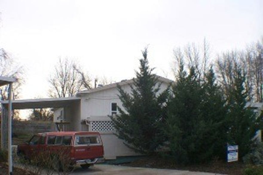 1997 Champion Double wide on an oversided lot with lots of garden space and fruit trees. Seperate 11x11 storage shed and shop. Wheelchair access ramp (coverd) 2x6 ext. walls, immaculate condition, priced to sell. Space #16, lots of skylights!