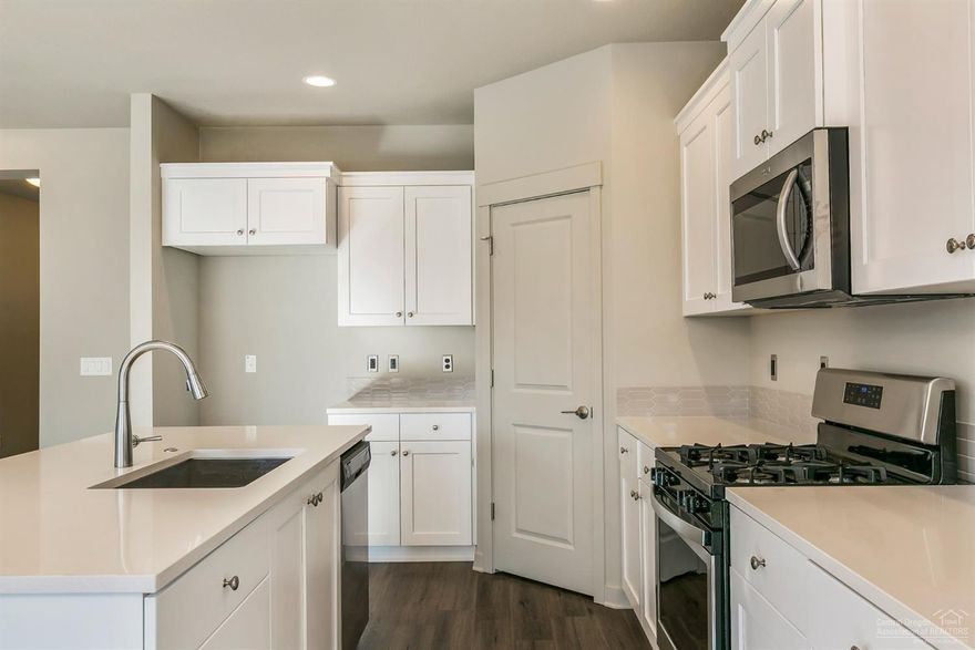 The Carrera plan, built by Pahlisch Homes in Phase 4 of Crescent Creek, is a fantastic value! Single level home is due for completion in mid-February and full of features! Upgraded gas fireplace with rock surround, hearth & mantle for a cozy feel. Quartz counters & wood-look, easy maintenance LVP flooring thru-out living areas, plus coffered ceilings in Great Room & Master Suite. White shaker style cabinets. NW Craftsman exterior detailing with covered front porch and covered rear patio! Xeriscape yard with drip system and Global Smart-Home Products! Model Home Hours: Fri-Sun 12 to 5 pm, follow the signage posted on street. Carrera-2-G-1579-1(GL).