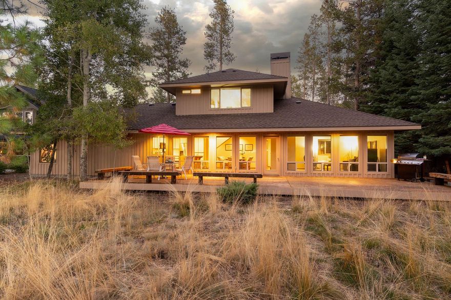 Welcome to 8 Fir Cone Lane, a well-appointed high desert retreat on a serene .30 acres with an expansive back deck alongside the 10th fairway of the Woodlands Golf Course. Situated in Sunriver on a quiet, dead-end street with separate bike path, with just an eight- minute stroll to owners' pool complex, tennis courts, and golf course amenities. Room for everyone in 3-generously sized bedrooms, 2-full bathrooms, and bonus room in a family-friendly 2,036 square feet of living space. This meticulously maintained home features thoughtful details including an abundance of wood wrapped windows, hardwood floors, wood burning fireplace, spacious laundry room, and oversized two-car garage. Updates include new Energy Star® windows, appliances, carpets, furnace, and water heater. Open concept great room and separation of sleeping and living spaces create a warm and welcoming space for family and friends to gather. Soak in the hot tub under the stars after a day of adventure. Create your legacy!