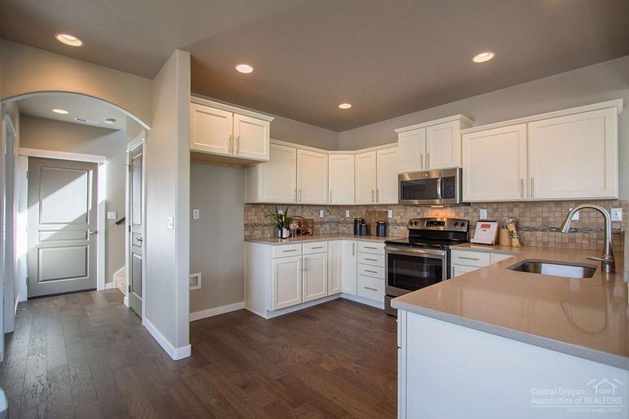 This <b>3 Bed + Den, 2.5</b> bath Metolius floorplan is a comfortable and efficient 2 story home at an exceptional value. The open kitchen features beautiful <b>quartz countertops, cabinetry with soft close doors and drawers,</b>and<b> stainless steel appliances</b>!!! It is the hub of your downstairs living & dining areas. Escape upstairs to your master suite featuring beautiful <b>Mt. Washington and Jefferson views</b> with an expansive closet with windows in addition to a dual vanity. This home also has a <b>den</b> that is a wonderful flex space while the remaining two bedrooms separate. Note: pictures are of a like home with different selections. Visit the model home at 2511 NW Hemlock Way, Redmond, OR 97756 for more information. January move in!!!