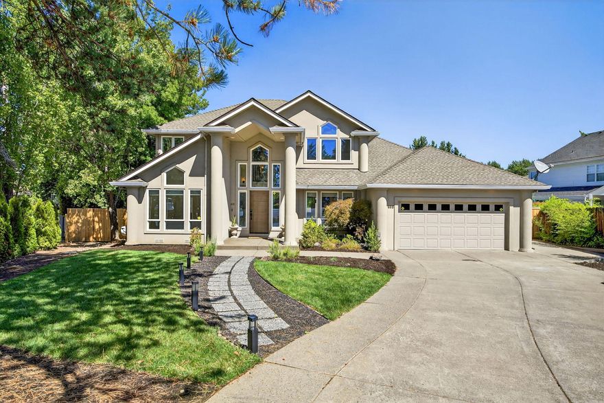 Located near the Rogue Valley Country Club, this beautiful two-story home is situated on a quiet circle in desirable East Medford. The updated kitchen features an island, new granite counters, and opens up to the dining and family room. The home features 3 bedrooms, 2.5 baths, plus a living room, family room, formal dining, casual nook, and indoor laundry, the layout offers both functionality and comfort. The spacious primary suite includes a walk-in closet, soaking tub, large shower, and dual sinks. Enjoy new flooring throughout the home, a finished garage with room for two cars and a golf cart, along with a workbench. Outdoors featuring a large backyard and covered patio provide the perfect space for entertaining or relaxing. Surrounded by similar high-quality homes, this property is a wonderful opportunity in one of Medford's sought-after neighborhoods close to shopping, restaurants, medical offices, golf course, and hospital.