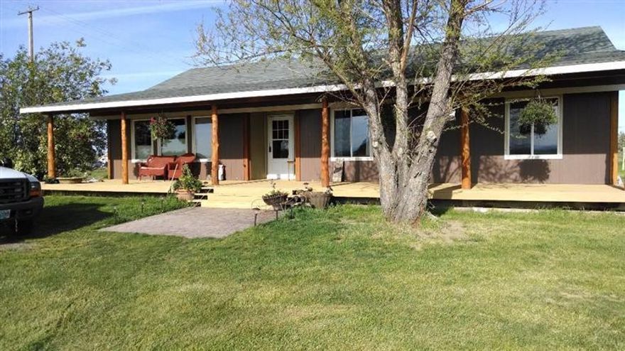 1944 square foot home on 5acres with 3 acres of COI water rights, located on a dead end rd. Engineered hard wood floors, marble counter tops vaulted ceilings, covered front porch, stamped concrete with exposed aggregate patio in the back of home and amazing views are just a few of the amenities this home has. Property is set up for livestock, Barn/shop with wash rack grain storage and property has farm deferred taxes.