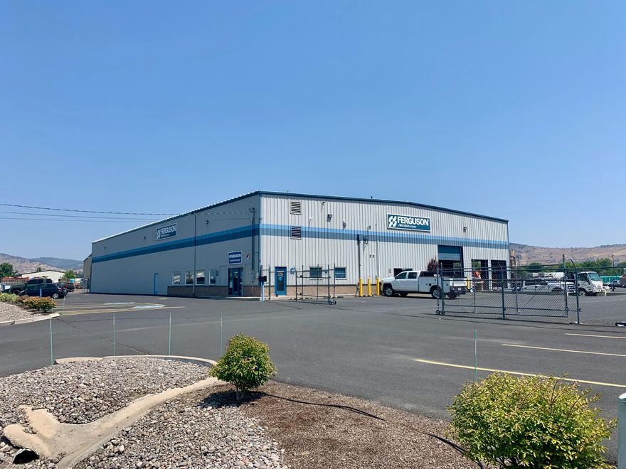 INVESTMENT OPPORTUNITY:  Excellent Tenant with 2 years remaining on the lease with one additional 3-year Option to Renew. Tenant has been in the building since 1998. Steel-frame building (16,000 SF per lease) with small retail area and large warehouse. Property is in very good condition. Two-acre lot, zoned Heavy Industrial and located off busy Washburn Way corridor. Asphalt parking lot. Secure fenced asphalt and gravel parking areas. NN Lease: Tenant pays base rent, property taxes, all utilities and insurance. Owner pays for major systems. Sale price represents a 7.3% CAP rate.  Showings to be scheduled as part of a buyer's due diligence and after review of lease. **Please Do Not disturb tenant**