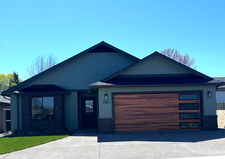 Brand new custom home completed this week. Never been on the market before. Just listed is a brand new, very custom home that has the best of everything. Located at the end of a quiet street in a great neighborhood, this high-quality home features a large backyard, gorgeous brick and stone accents outside and inside, Mahogany plank floors, and an enormous kitchen with an upgraded appliance package.

The interior of the home also features a combination of sun tunnels and a skylight, highlighting the soaring ceilings in most rooms. There is a gas stone-faced fireplace, an oversized master shower, and LED mirrors in both baths. This sumptuous home is energy efficient and lacks nothing but the new owners. Call today for a private tour.