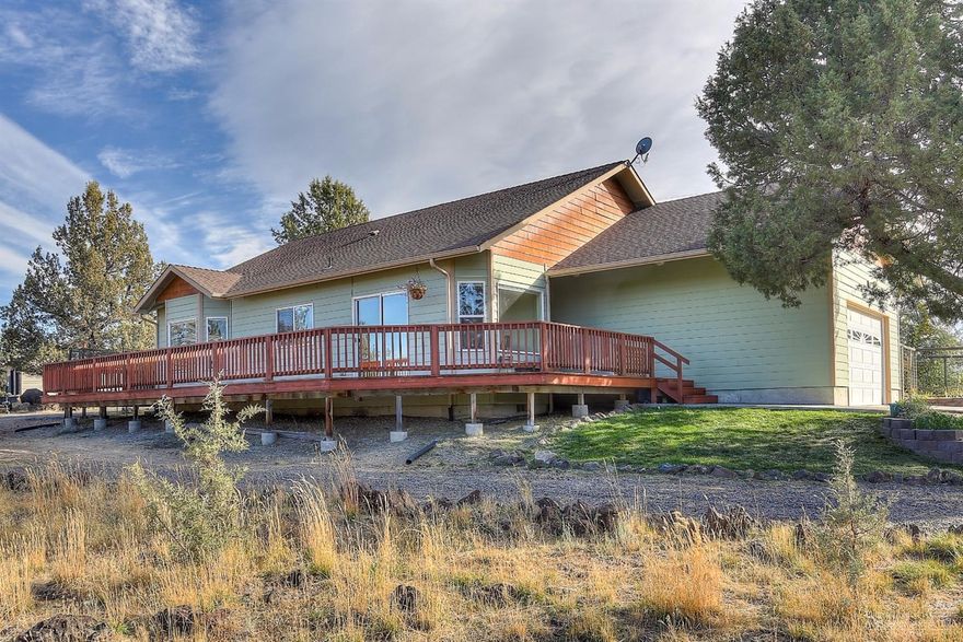 Beautiful, bright home in CRR. Hardwood floors, wrap around deck, 2 car attached garage, 20x30 shop, storage shed, circular driveway and wonderful view of Mt. Jefferson. Bring your toys! Tons of room. Come see everything that this home has to offer and check out the huge fenced garden.