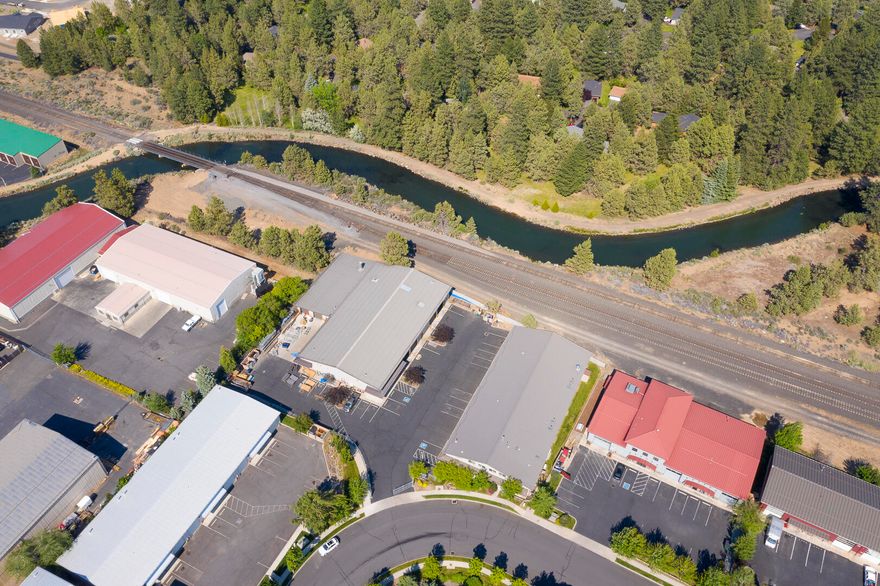 Great investment opportunity! Light industrial and flex space located in American Loop Industrial park in SE Bend! The parcel consists of two buildings on separate tax lots totaling 1.32 acres! Between the two buildings there is   25, 766 square feet, of which 4722 square feet are office space/showroom, the remaining 21,000 is manufacturing space divided into three large areas. The buildings were constructed in 2005 and are metal framed, with 3 phase power.