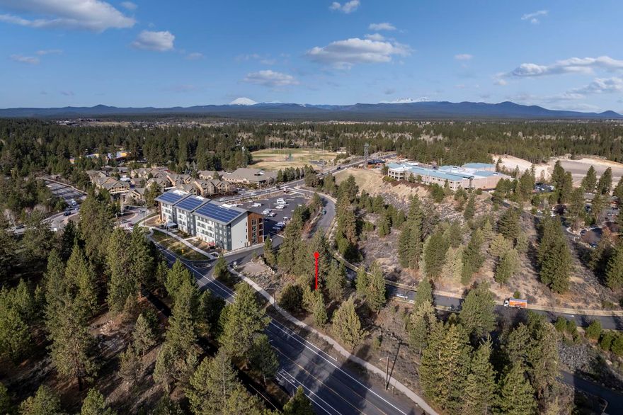 Don't miss out on this MU lot in a booming location. Only one block from the OSU campus, this property is on the main road to Mt Bachelor and the Cascades Lake Highway. Coming soon across the street is a 250+ unit apartment complex and a luxury condo complex. Only minutes from historic downtown, the Old Mill, Deschutes River, and all things Bend. A perfect opportunity for investors looking for high visibility.